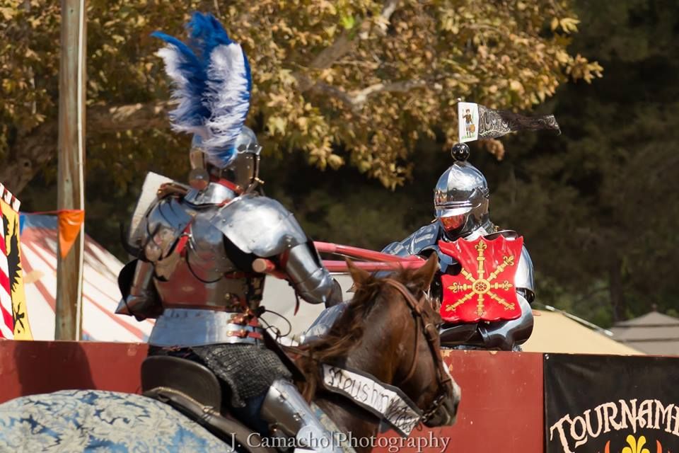 Luc Petillot(left) jousts Toby Capwell(right) who is wearing the gold escarbuncle shield (photo by J. Camacho Photography)