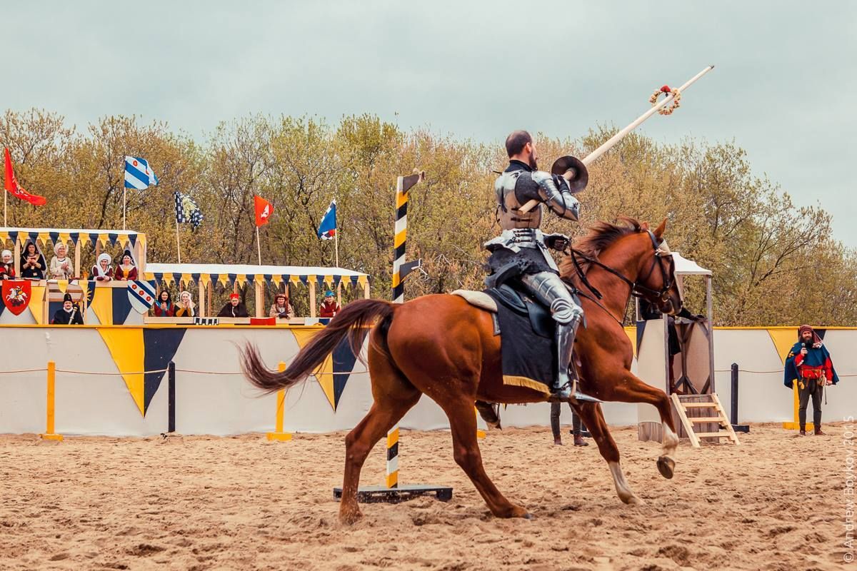 Jouster Arne Koets successfully spears a ring of flowers with his lance during the Tournament of St George 2015 in Moscow, Russia(photo by Andrew Boykov/Ratobor Show)
