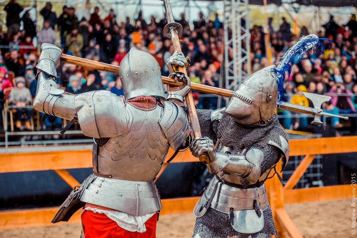 Russian jousters Viktor Ruchkin(left) and Yuri Bogunov(right) fight with poleaxes during the Tournament of St. George 2015, Moscow, Russia(photo by Andrew Boykov/Ratobor Show)