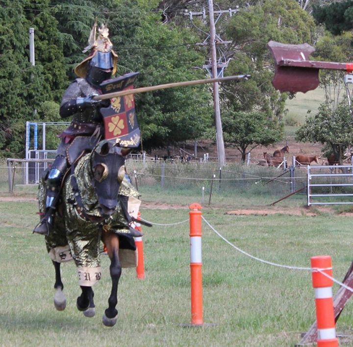Jouster Rod Walker of Australia jousts against the quintain in his new 14th century armour (photo by Michelle Walker)
