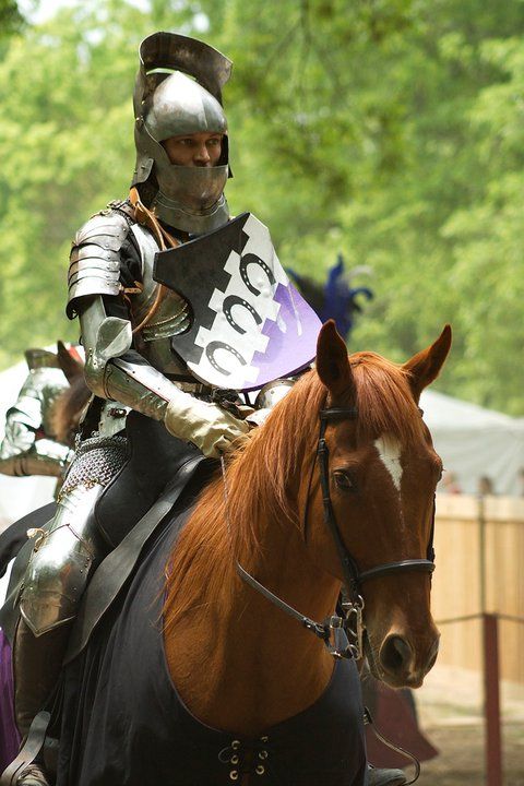 Jouster Ryan Saathoff wearing the type of jousting shield called an ecranche (photo by Jay Baum)